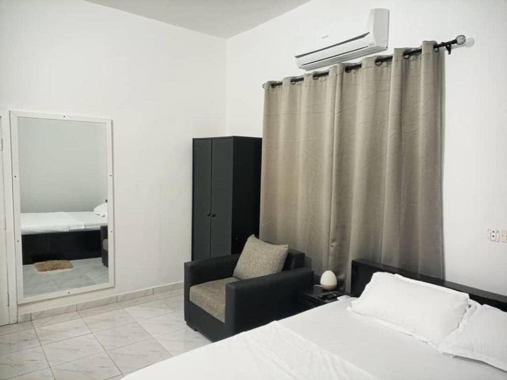 Ad Home Lome Bagian luar foto