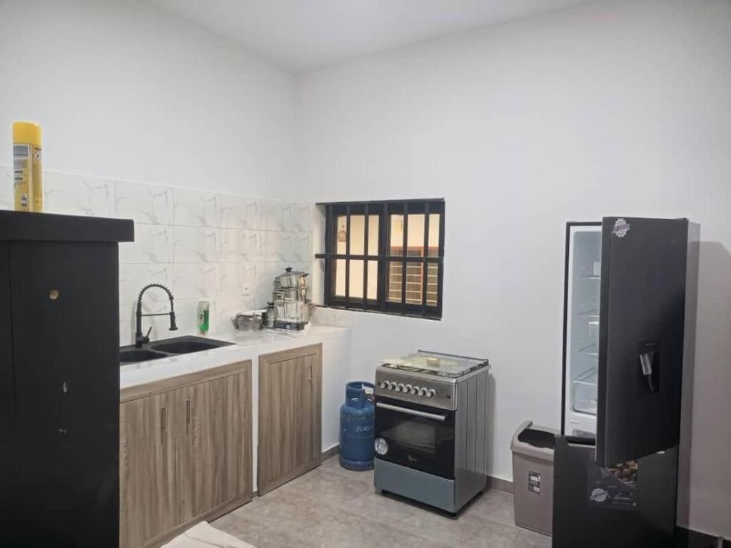 Ad Home Lome Bagian luar foto