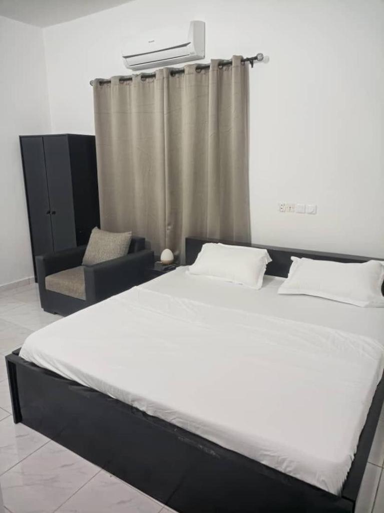 Ad Home Lome Bagian luar foto