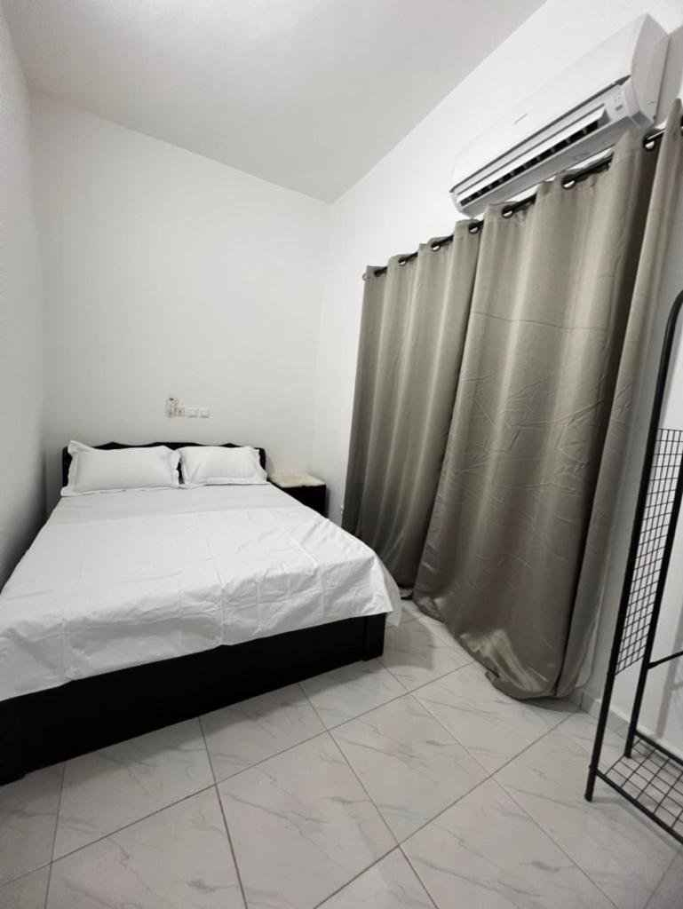 Ad Home Lome Bagian luar foto