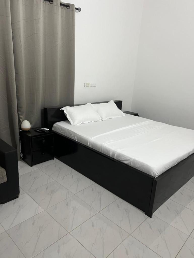 Ad Home Lome Bagian luar foto